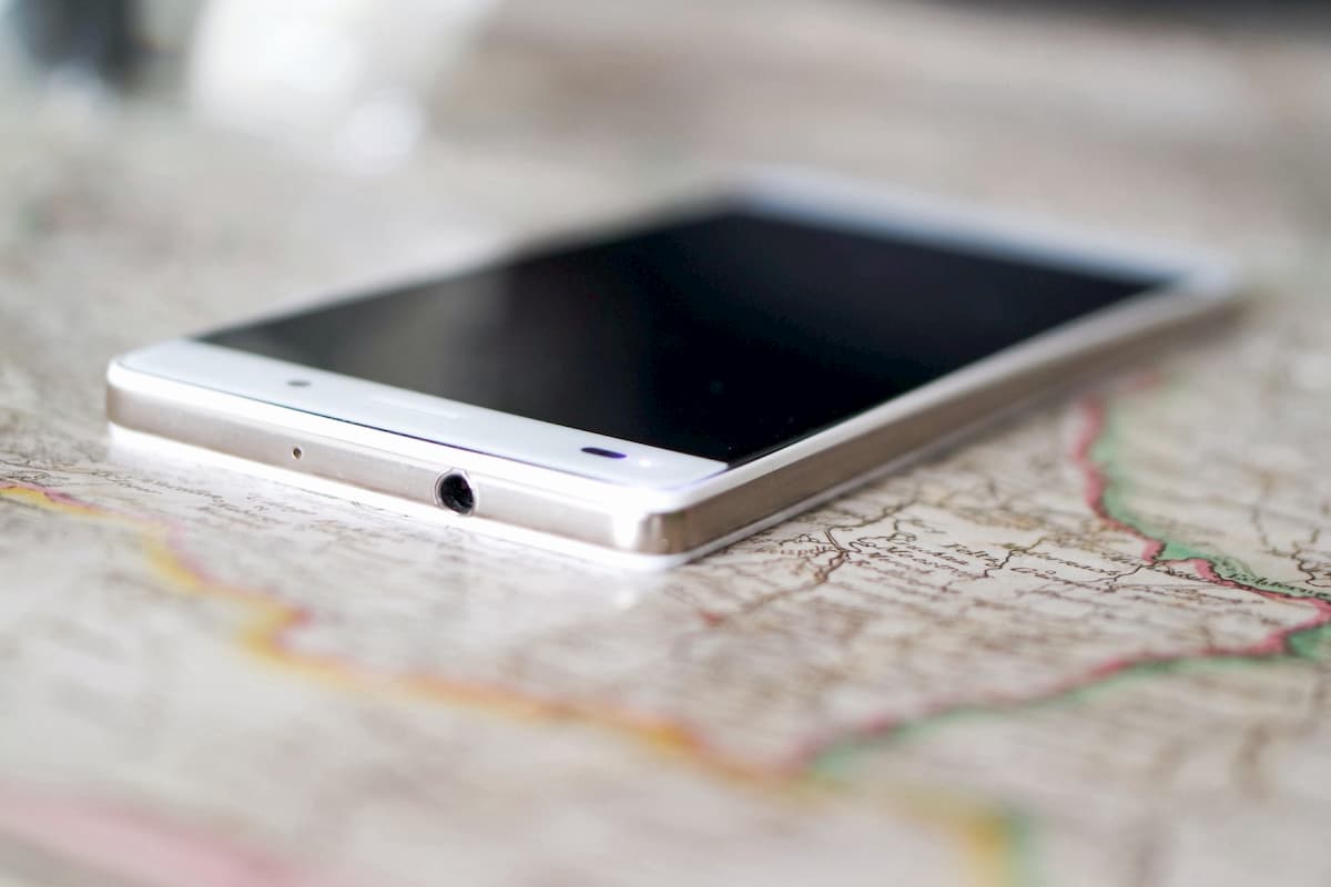 a mobile phone on a map
